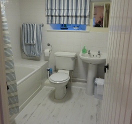 Image of the bathroom in Horseshoe and Anvil self-catering cottages at The Old Forge, Wilton